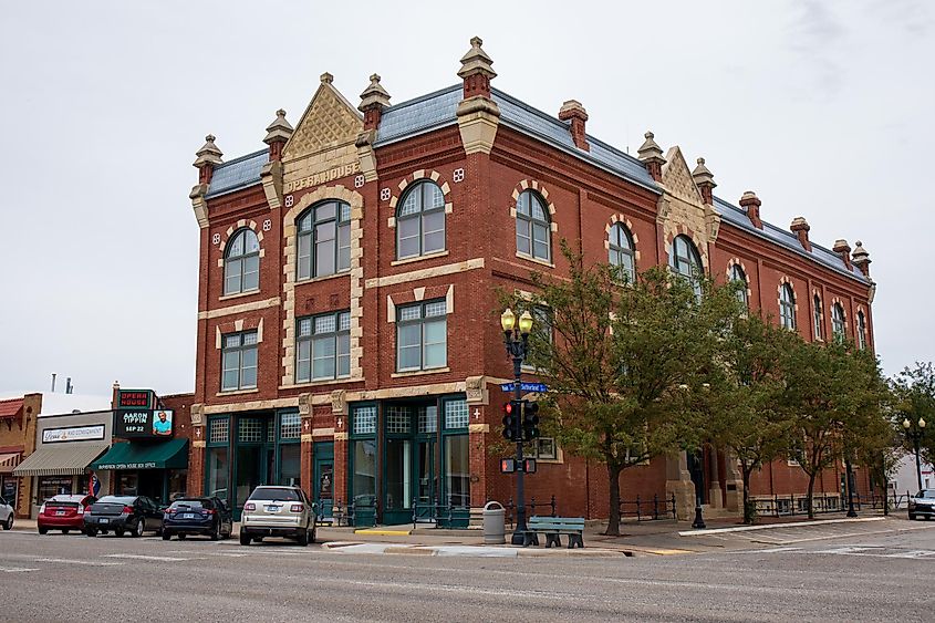 Exterior of old opera house with colorful brick work, via Rexjaymes / Shutterstock.com