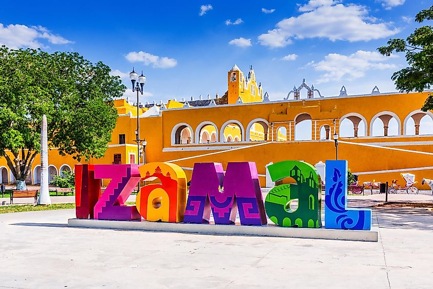 Izamal, Mexico - April 24, 2019 - Convent of Saint Anthony of Padua and city sign.
