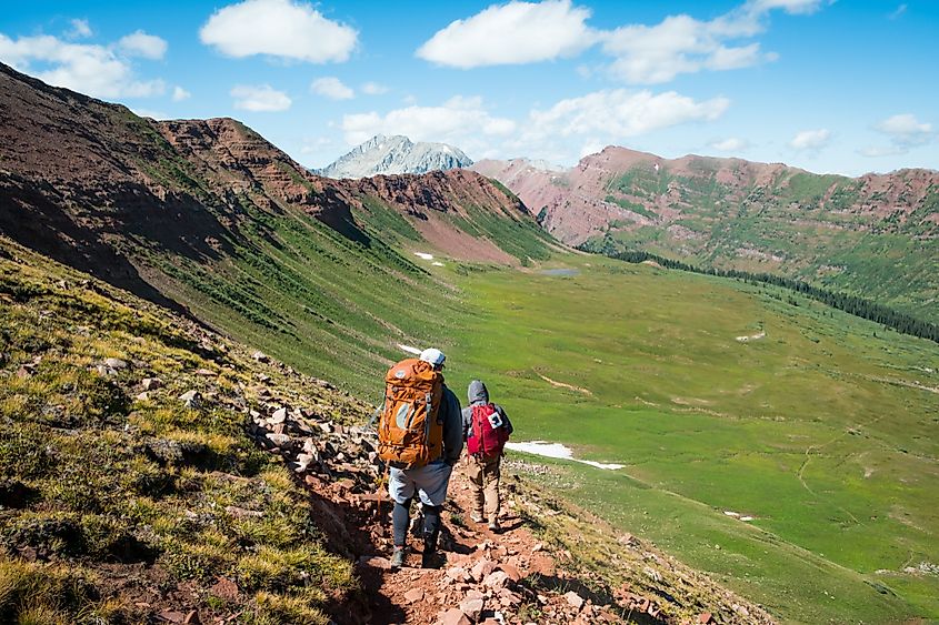 Experienced backpackers hike their way around the Maroon Bells, completing the Four Pass Loop on a 2 night wilderness camping trip