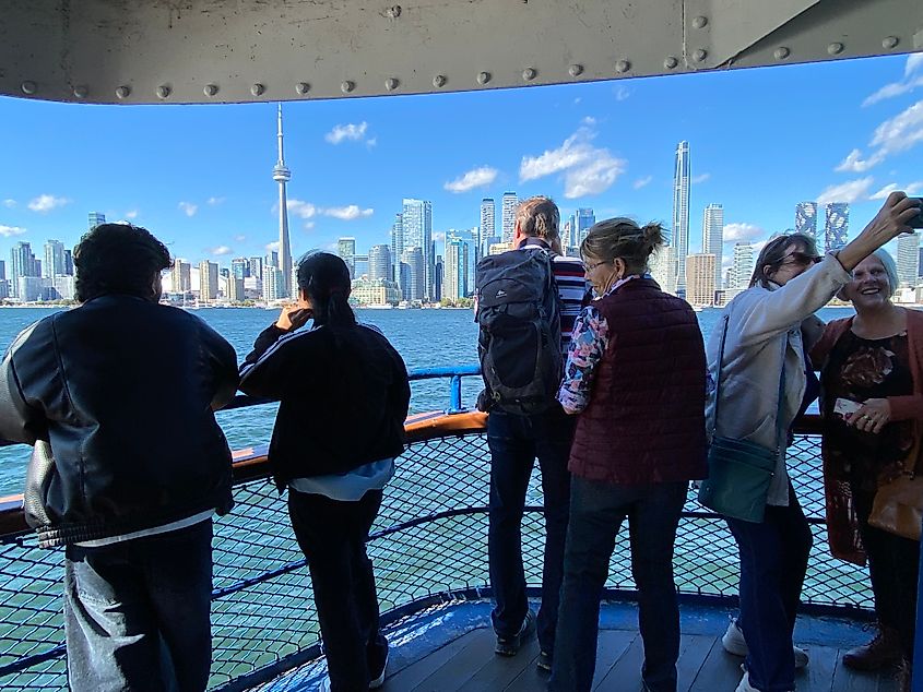Toronto's skyline as seen by passengers aboard a ferry.