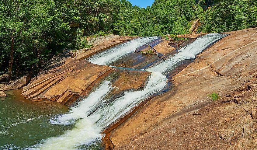 Watering running over a large rock at Bridal Veil Falls, Tallulah Falls, Georgia