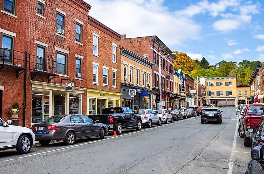 Railroad Street lined with traditional brick buildings in Great Barrington, Massachusetts. 