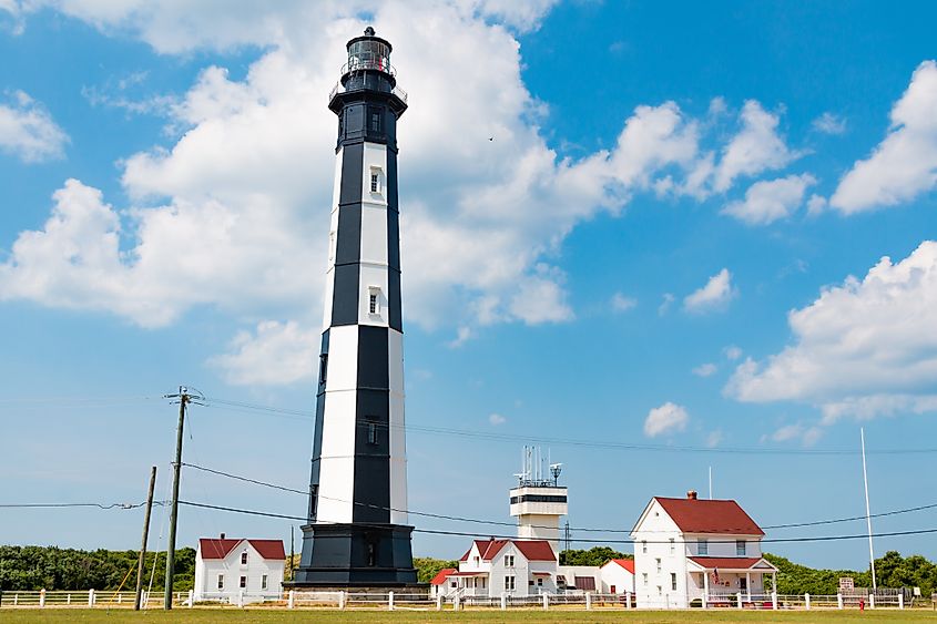 Located on the Fort Story military base, the New Cape Henry lighthouse with outbuildings, which was built in 1881 to guide vessels in the Chesapeake Bay. Editorial credit: Sherry V Smith / Shutterstock.com