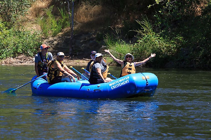 A group of people rafting on the South Fork of the American River in Lotus, California