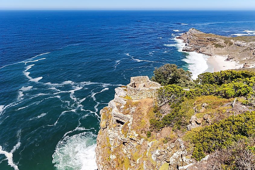 The rocky shore of Cape Agulhas, where the Indian and Atlantic Oceans meet.