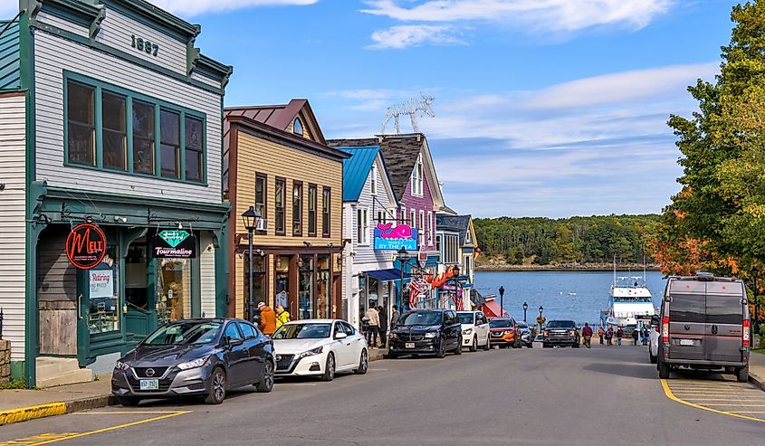 A sunny Autumn morning view of the historic Main street of the resort town on Mount Desert Island at shore of Frenchman Bay.