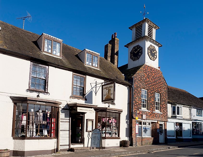 The clocktower dominates picturesque Steyning high street in West Sussex. Editorial credit: Charles Bowman / Shutterstock.com