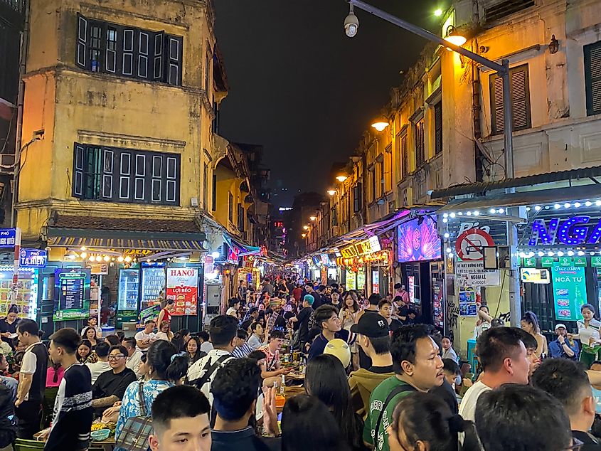 A packed crowd lines the aptly named Beer Street at night in Hanoi, Vietnam.