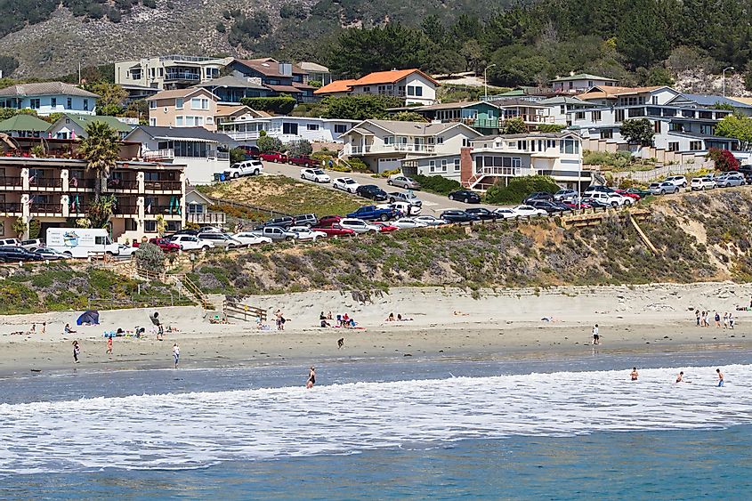 Beautiful houses lining the front of the beach, view from Avila Pier, via Nature's Charm / Shutterstock.com