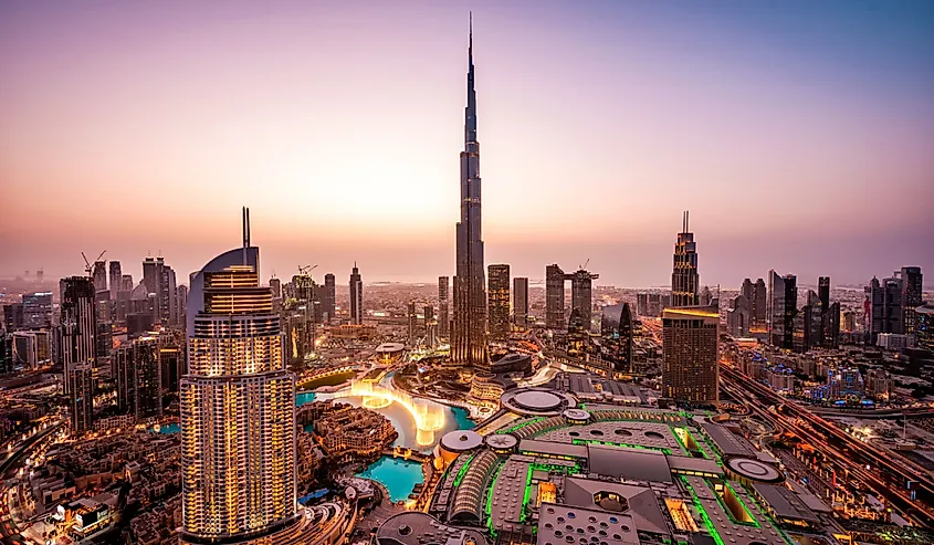 View of the Dubai city skyline at night. 