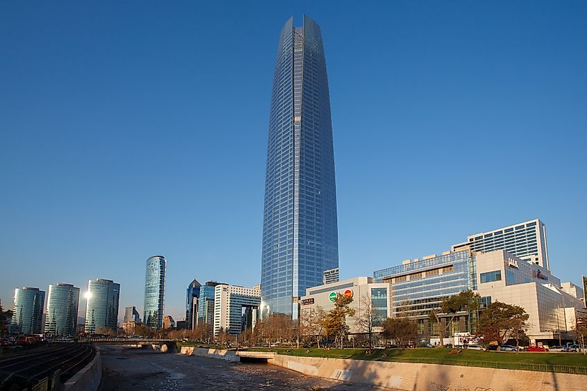 The Costanera Center skyscraper office tower, the shopping mall and the office buildings at the shore of the Mapocho river in Santiago de Chile. Editorial credit: ALEXANDRE F FAGUNDES / Shutterstock.com