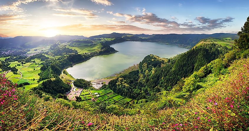 Sunset over Furnas Lake, mountain landscape panorama from Pico do Ferro, Sao Miguel Island, Azores, Portugal. Credit: TTstudio / Shutterstock