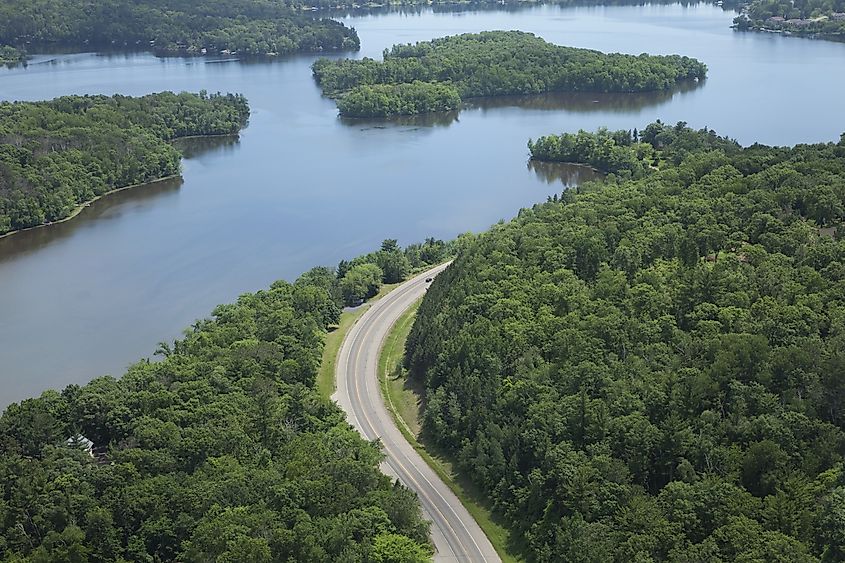Aerial view of the Mississippi River and a curving road near Brainerd, Minnesota. 