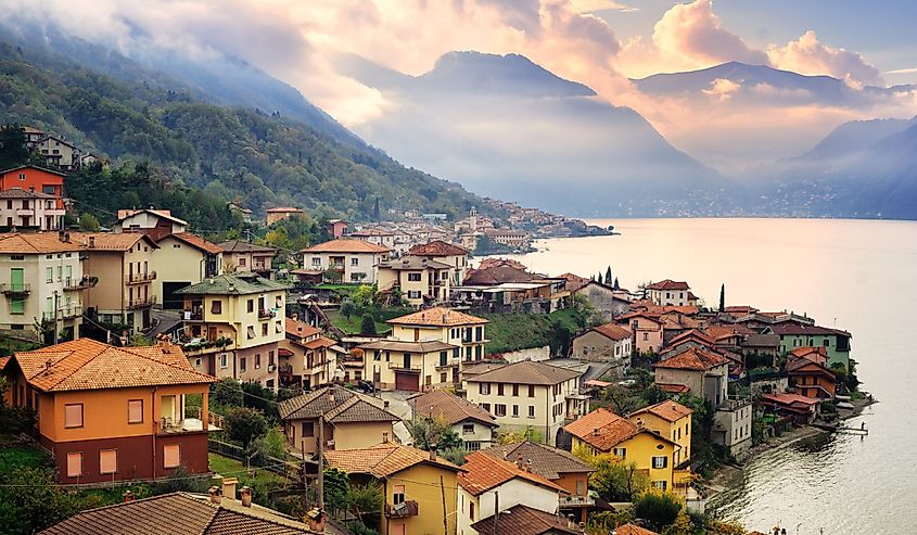 View of Como Lake, Milan, Italy, on sunset with Alps mountains in background