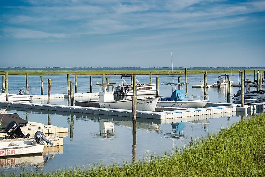 Dock with multiple boats on the bay in Sea Isle City, New Jersey.