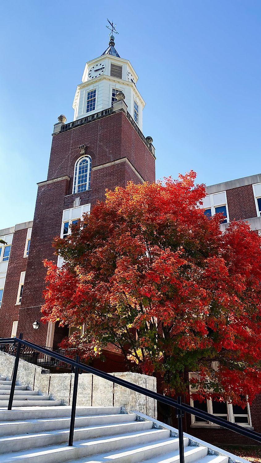 Pulliam Hall building with clock tower in fall colors at Carbondale, Illinois.