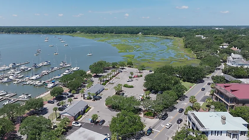 Aerial of marina and Waterfront Street with anchored sailboats, Beaufort, South Carolina