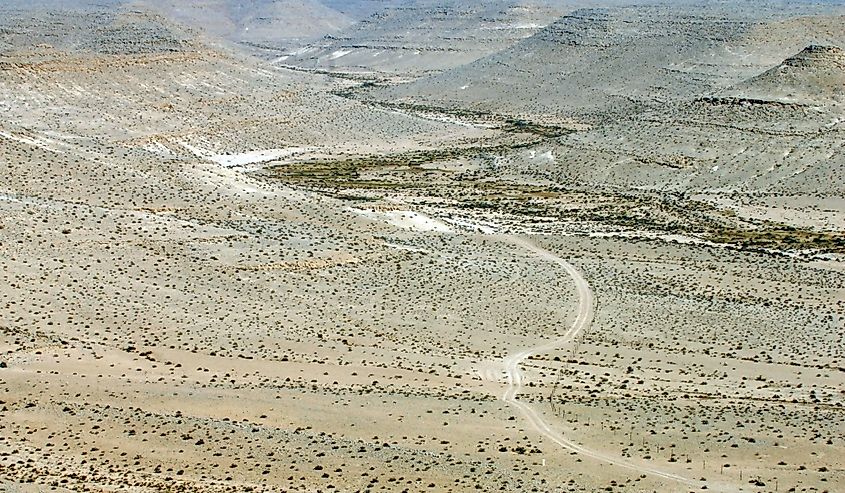 Aerial drone landscape point of view of the Incense Route in passing through the Negev desert from the ancient city of Avdat in southern Israel. 