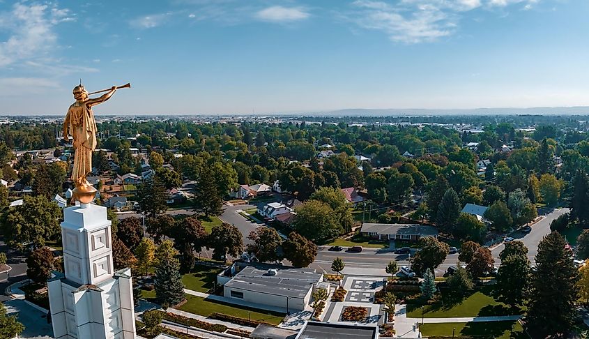 View of the temple in Idaho Falls, USA, showcasing the religious landmark against the town's backdrop.