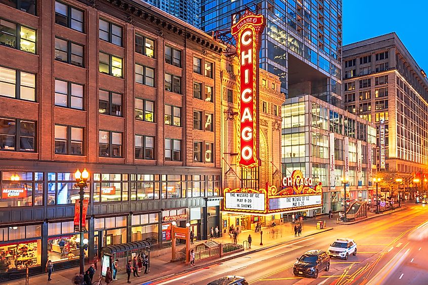 The landmark Chicago Theatre on State Street at twilight. The historic theater dates from 1921. Via Shutterstock / Sean Pavone