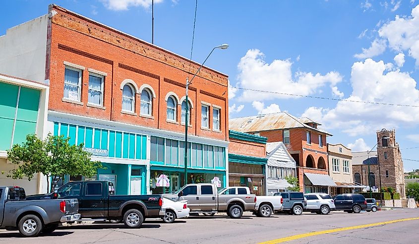 Cars parked in front of storefronts in the historic main street in Globe, Arizona