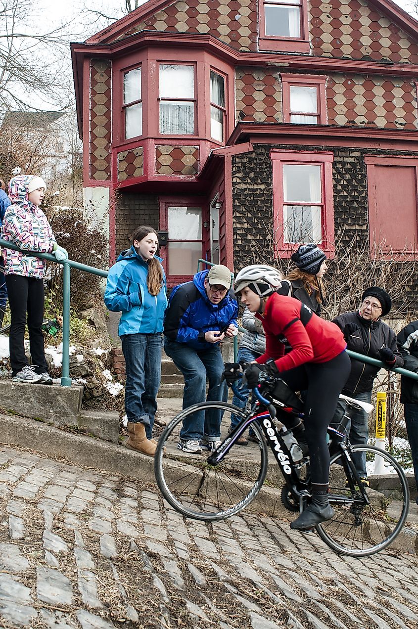 Riders struggle to make it to the top of Canton Avenue in Pittsburgh. 