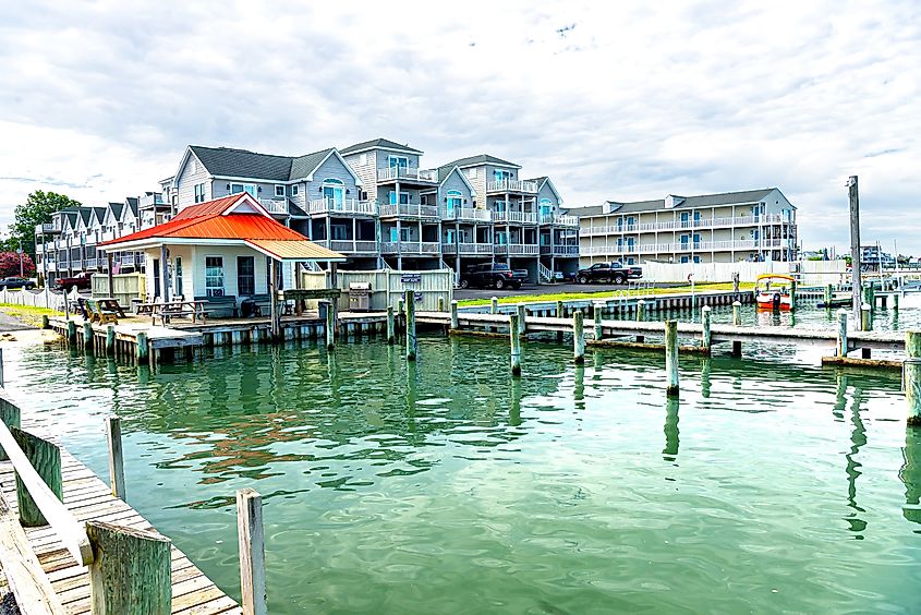 Chincoteague. Virginia. USA. August 15, 2020 Wooden pier and hotels next to the pier. Summer, Travel, Vacation and Holiday concept.