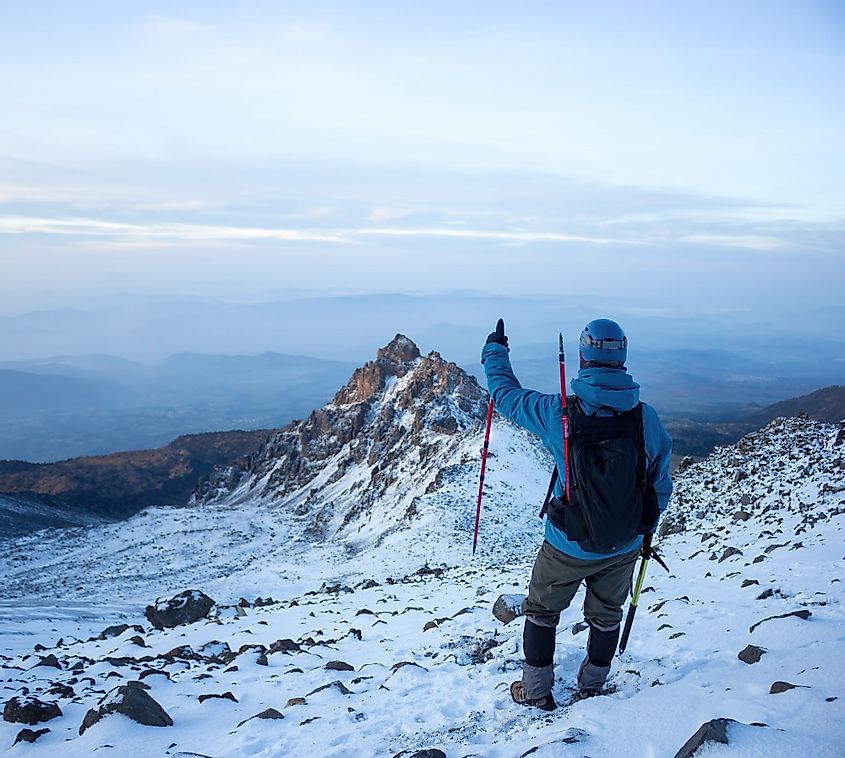 A hiker climbing the Pico de Orizaba volcano