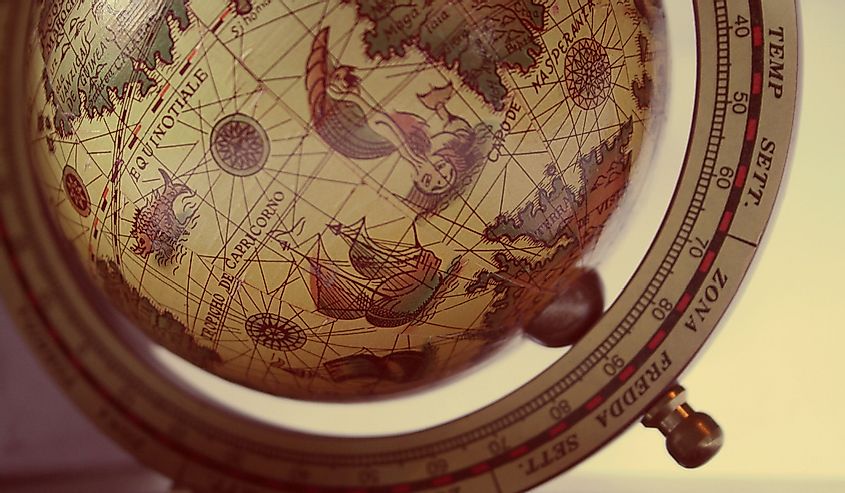 Vintage globe with illustrations and latin text - short depth of field. Shows Southern Atlantic Ocean region.