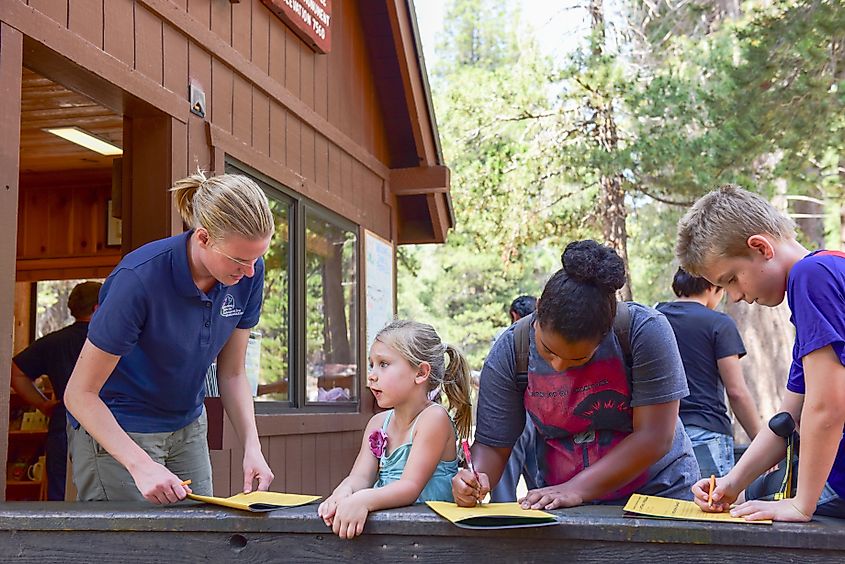 Children interview Eastern Sierra Interpretive Associate for Junior Ranger Program at Devils Postpile National Monument Visitor Center.