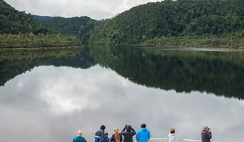 tourists enjoying a Gordon River Cruise in Tasmania, Australia