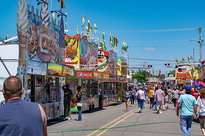 Carnival style street food vendors and crowd during Toad Suck Daze in Conway, Arkansas.