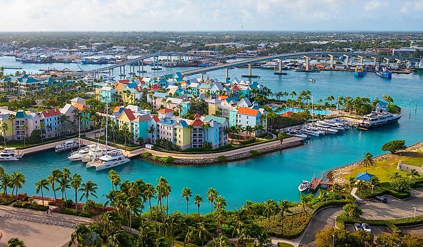 Harborside Villas aerial view at Nassau Harbour with Nassau downtown at the background, from Paradise Island, Bahamas.