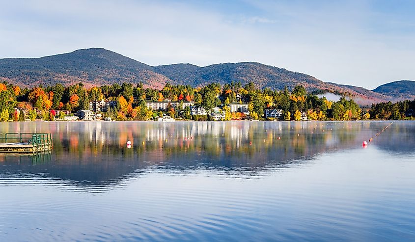 View of the Mountain Village of Lake Placid from a Foggy Mirror Lake at Sunrise