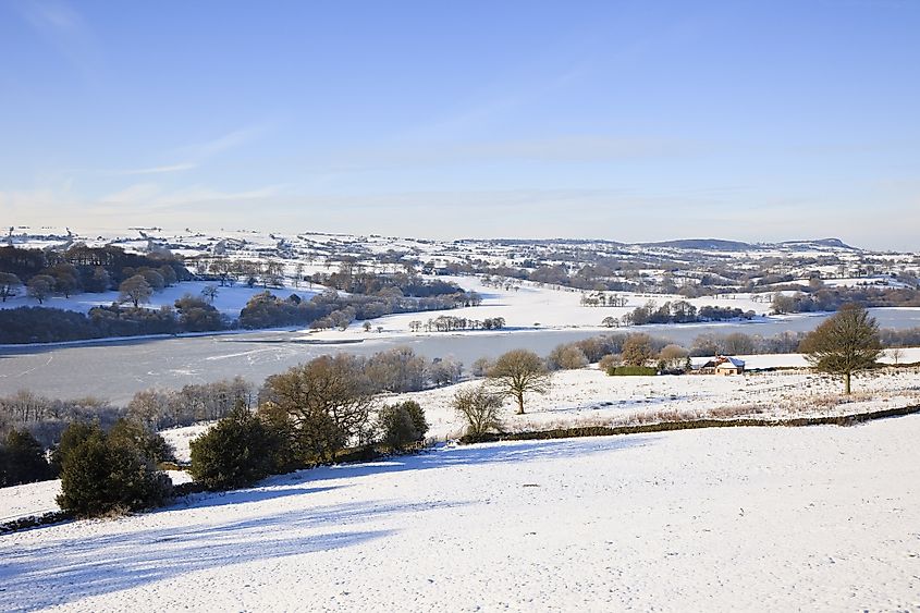 Rudyard Lake reservoir with snow in winter.