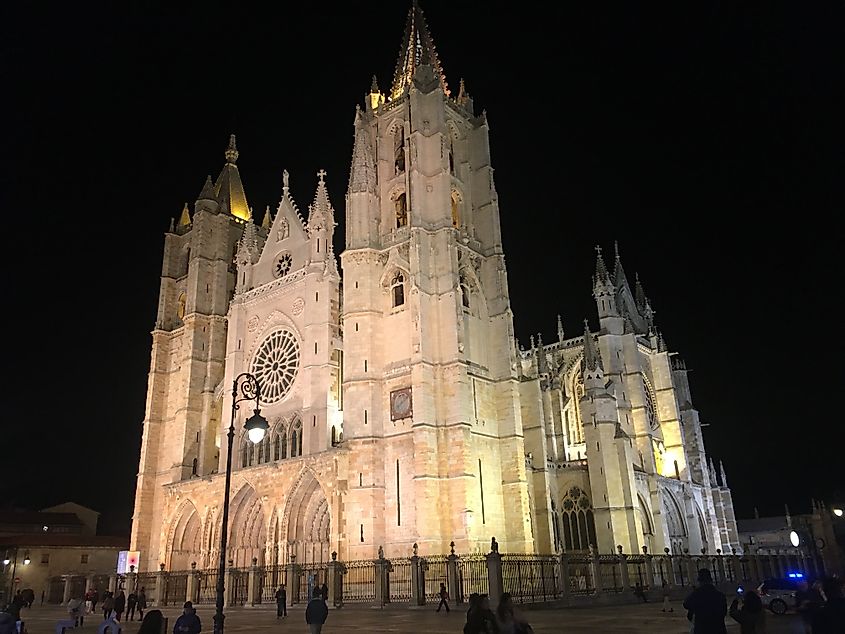 The grand Cathedral in the heart of Leon, Spain - glowing gold against the night sky.