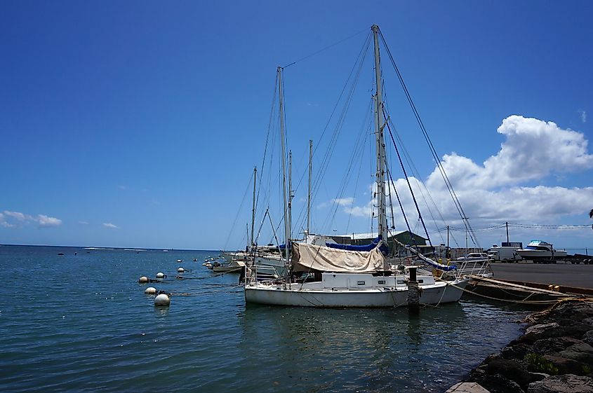 Boats sit in the water at Kaunakakai Ferry Terminal