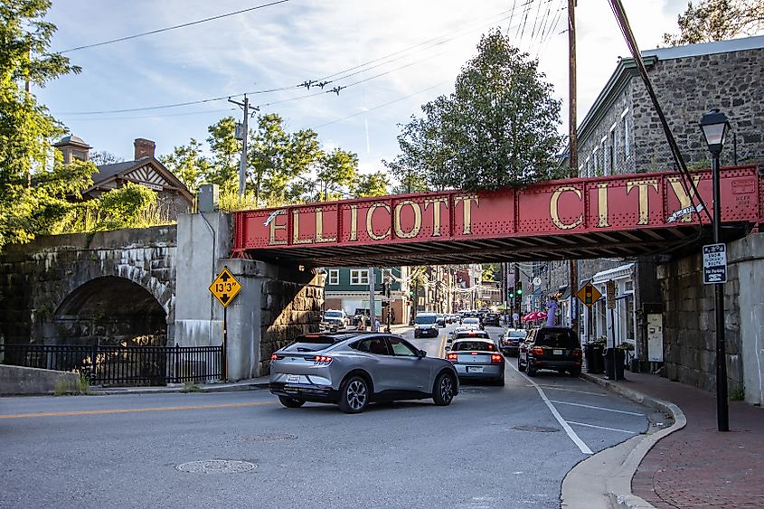 Cars travel beneath the Ellicott City railroad bridge in Ellicott City, Maryland