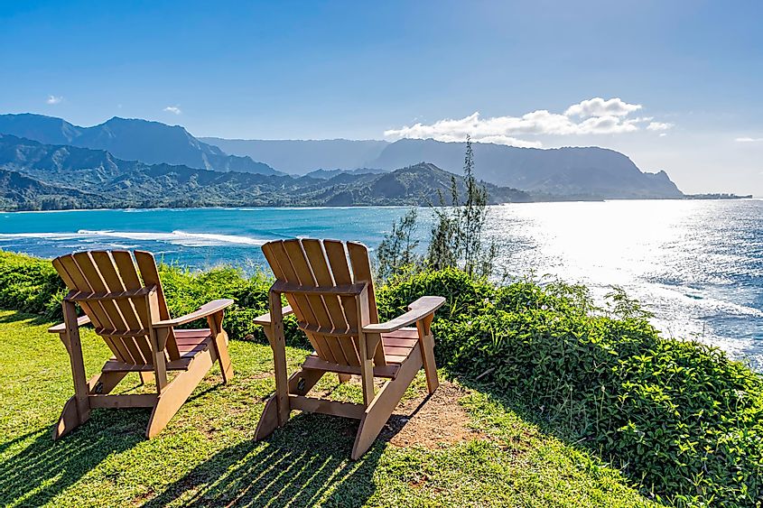 Lounging chairs overlooking Hanalei Bay and the Na Pali coast Princeville Kauai Hawaii