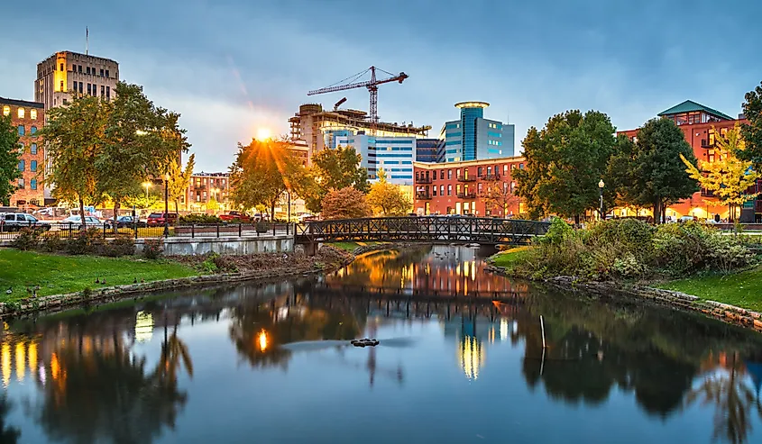 Kalamazoo, Michigan, USA downtown cityscape and park at dusk.