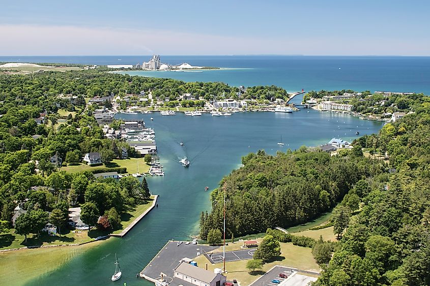 Aerial view of Round Lake in Charlevoix, Michigan, early summer, with boat traffic