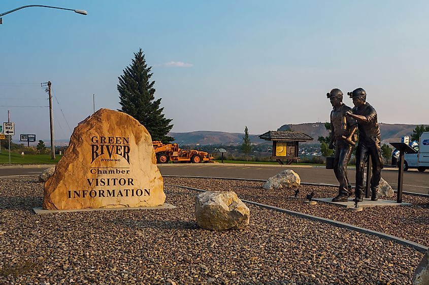 Statue of two miners and the Visitor Center Sign in Green River, Wyoming
