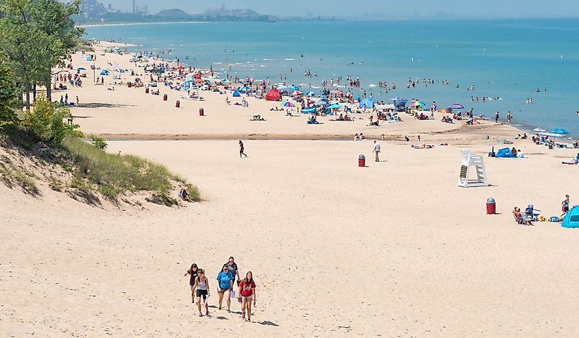 Portage, Indiana, USA. August 1. 2018. Beach scene on a sunny day at Indiana Dunes State Beach, Lake Michigan.