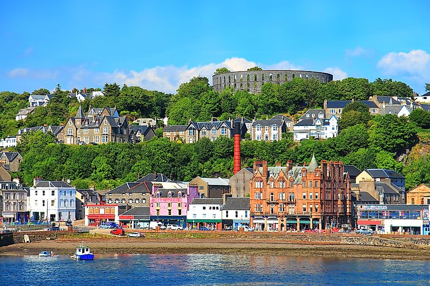 The coastal town of Oban, Scotland, seen across its harbor.