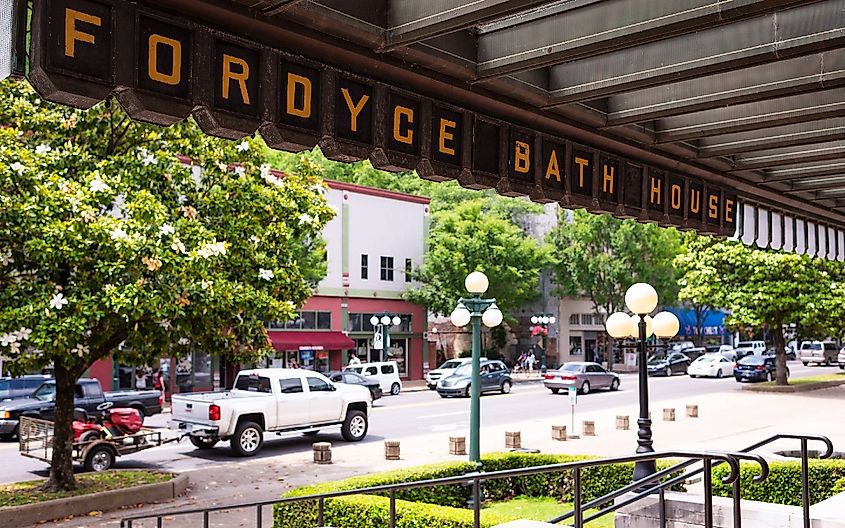 Historical natural mineral water spa bath house, bathhouse row with Fordyce sign building in National park by city street, Hot Springs, Arkansas