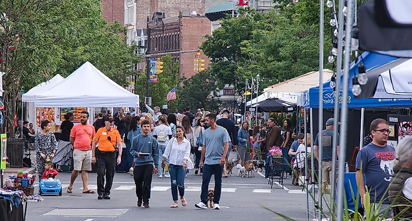 People enjoying themselves at Arts Crafts on Bedford in Downtown Stamford. Editorial credit: GREG PATTON / Shutterstock.com