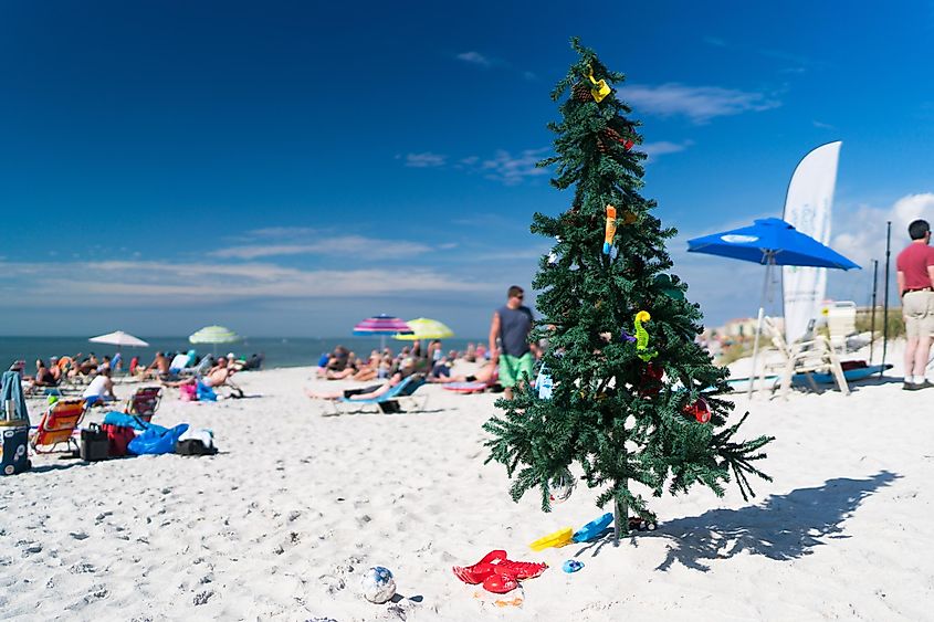 The white sand beach at Siesta Key, Florida, with a Christmas tree.