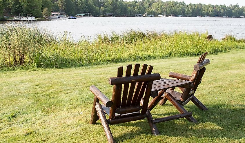 Two wooden Adirondack chairs in Eagle River, Wisconsin