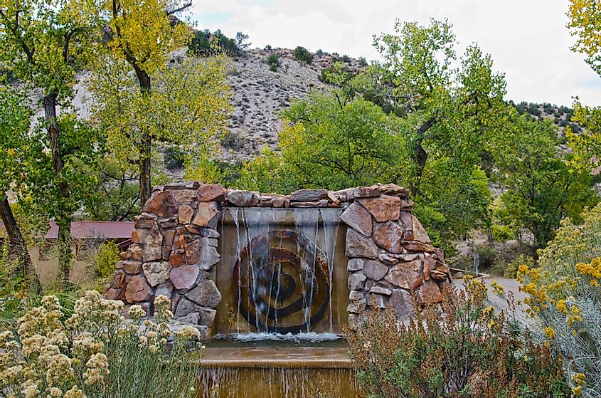 The entrance to Ojo Caliente Hot Springs in New Mexico is marked by a sandstone fountain