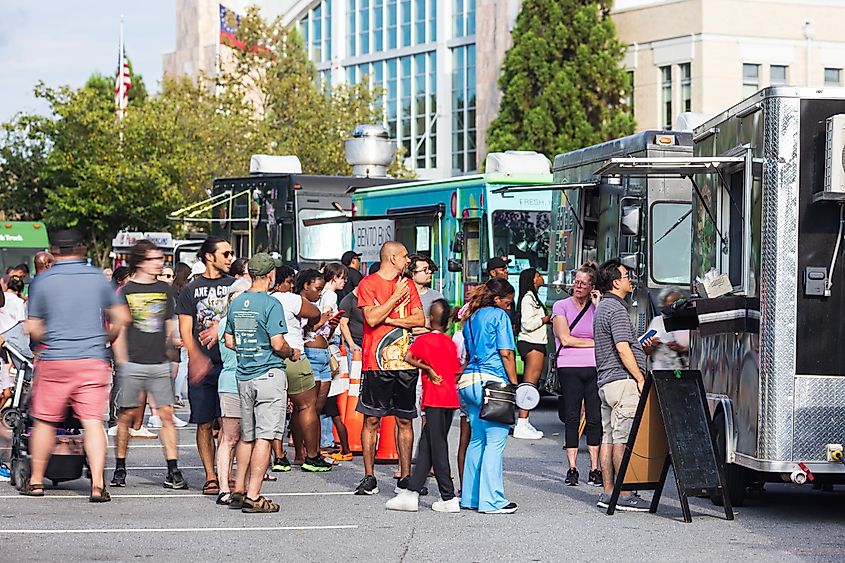 Suwanee, Georgia: People stand in line waiting to be served at Food Truck Friday